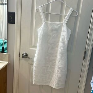 White bodycon dress. Perfect for beach or bachelorette party